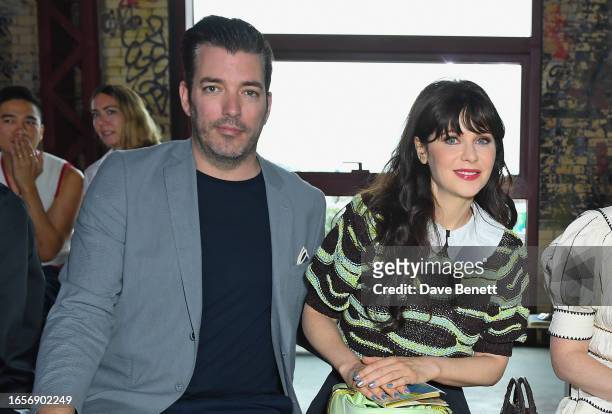 Jonathan Scott and Zooey Deschanel attend the Ulla Johnson SS24 front row during New York Fashion Week September 2023 at Powerhouse Arts on September...