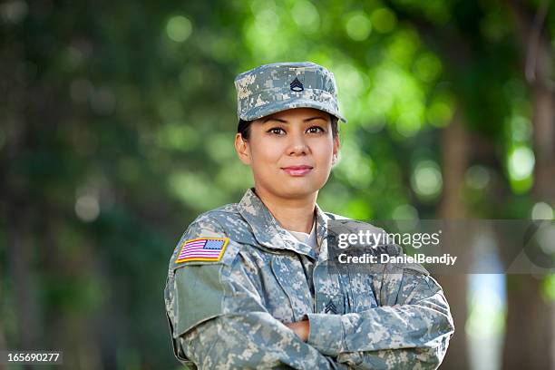 female american soldier series: outdoor portrait - army woman stock pictures, royalty-free photos & images