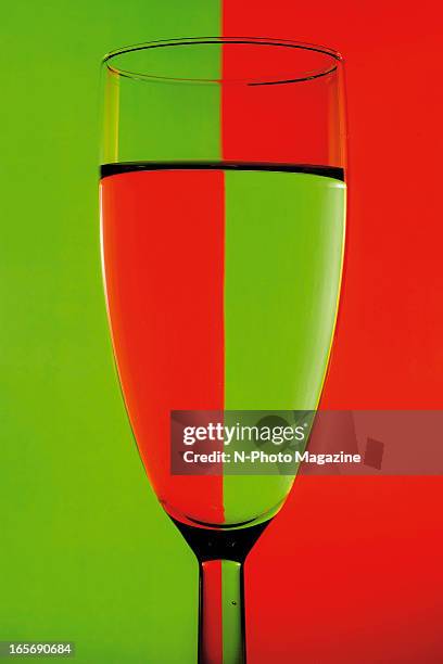 Wine glass filled with water in front of a red and green background photographed during a shoot for N-Photo Magazine/Future via Getty Images, August...