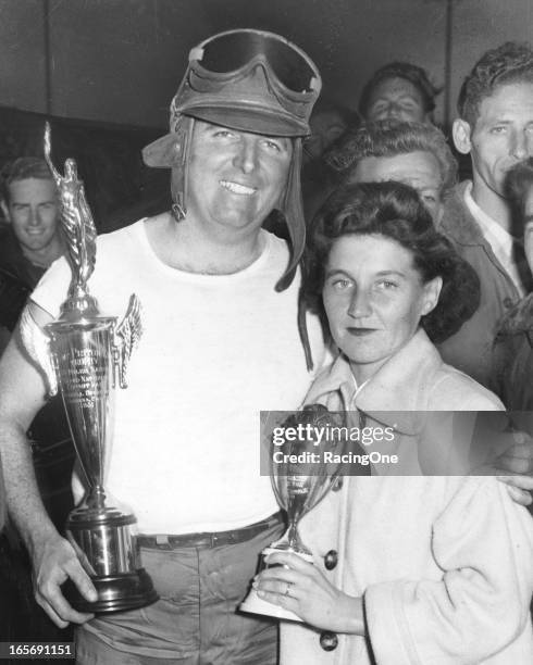 May 8, 1951: Marshall Teague and his wife Mitzy in victory lane after Teague won the NASCAR Cup race at Carrell Speedway driving his Hudson Hornet.