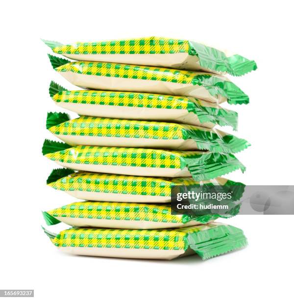 packaged biscuits isolated on white background - packet stock pictures, royalty-free photos & images
