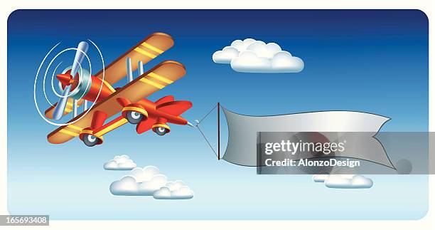biplane with banner - biplane stock illustrations