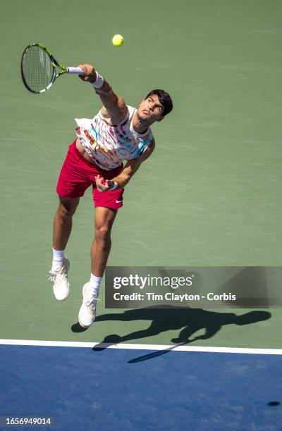 September 2: Carlos Alcaraz of Spain serves against Daniel Evans of Great Britain in the Men's Singles round three match on Arthur Ashe Stadium...