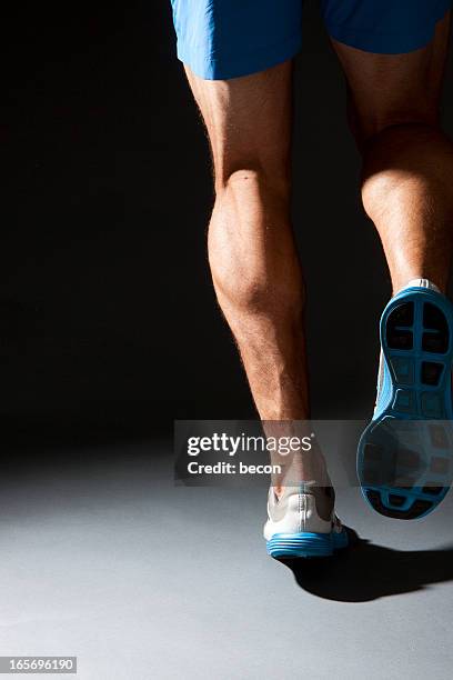 running man - calf human leg stock pictures, royalty-free photos & images