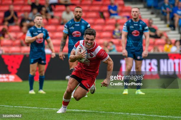 Salford Red Devils' Brodie Croft scores his team's third try during the BetFred Super League match between Salford Red Devils and Warrington Wolves...