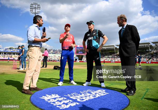 England captain Jos Buttler tosses the coin alongside New Zealand captain Tim Southee ahead of the 3rd Vitality T20 International between England and...