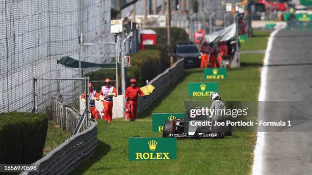 Yuki Tsunoda of Japan driving the Scuderia AlphaTauri AT04 stops on the formation lap during the F1 Grand Prix of Italy at Autodromo Nazionale Monza...