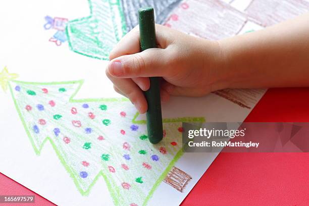 child drawing christmas image - drawing activity stock pictures, royalty-free photos & images