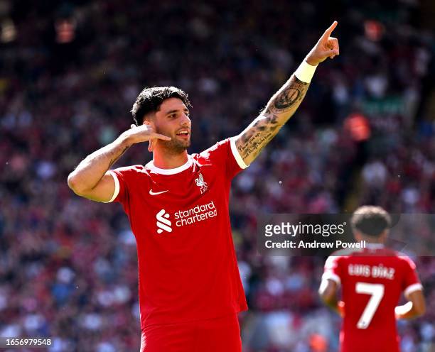 Dominik Szoboszlai of Liverpool celebrates after scoring the opening goal during the Premier League match between Liverpool FC and Aston Villa at...