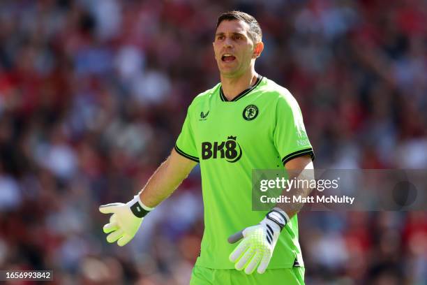 Emiliano Martinez of Aston Villa reacts during the Premier League match between Liverpool FC and Aston Villa at Anfield on September 03, 2023 in...