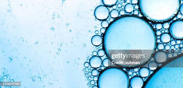 blue bubbles abstract - oil bubbles stock pictures, royalty-free photos & images
