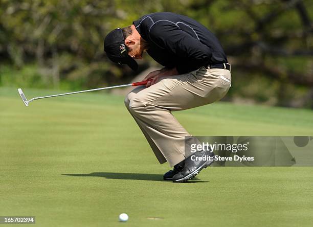 Charl Schwartzel of South Africa reacts to missing his birdie putt on the 6th hole during the second round of the Valero Texas Open at the AT&T Oaks...