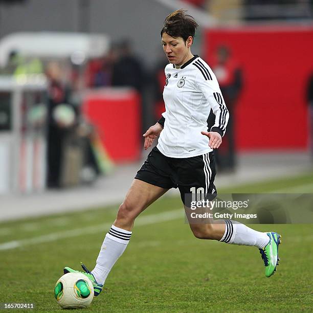 Linda Bresonik of Germany runs with the ball during the Women's International Friendly match between Germany and the United States at...