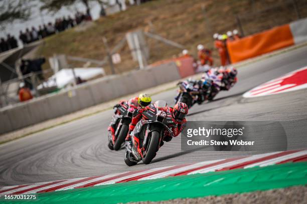 Maverick Viñales of Spain and Aprilia Racing rides in front of his teammate during the race of the MotoGP Gran Premi Monster Energy de Catalunya at...