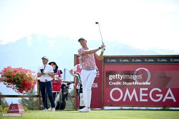 Adrian Meronk of Poland plays his tee shot on the 18th hole during Day Four of the Omega European Masters at Crans-sur-Sierre Golf Club on September...