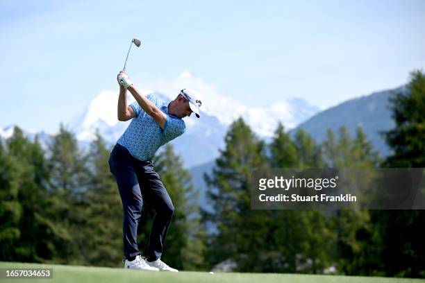 Alexander Bjork of Sweden plays his second shot on the 11th hole during Day Four of the Omega European Masters at Crans-sur-Sierre Golf Club on...