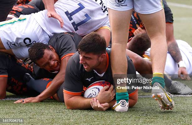 Matt Cornish of Ealing Trailfinders scores a try during the Premiership Rugby Cup match between Ealing Trailfinders and Northampton Saints at the...