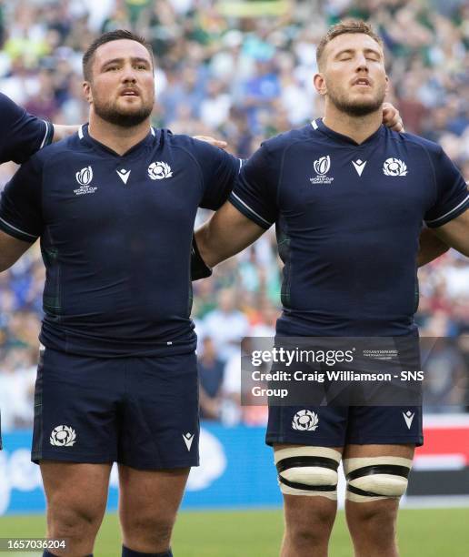 Scotland's Zander and Matt Fagerson sing the national anthem during a Rugby World Cup match between South Africa and Scotland at the Stade Velodrome,...