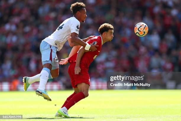 Boubacar Kamara of Aston Villa battles for possession with Curtis Jones of Liverpool during the Premier League match between Liverpool FC and Aston...