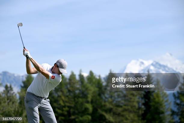 Matt Fitzpatrick of England plays his second shot on the 12th hole during Day Four of the Omega European Masters at Crans-sur-Sierre Golf Club on...