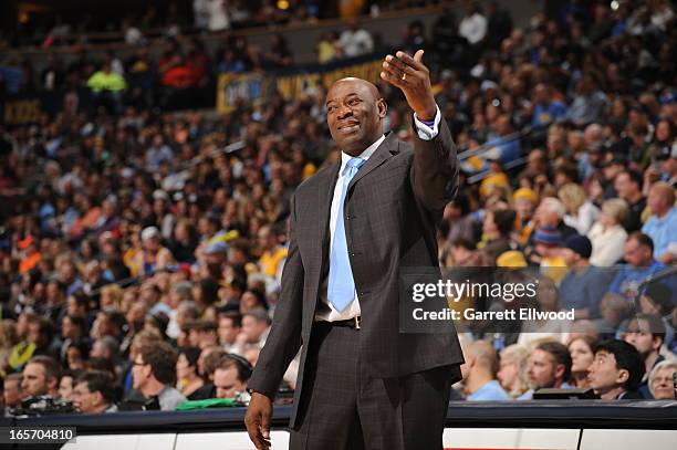 Keith Smart of the Sacramento Kings calls plays from the bench during the game against the Denver Nuggets on March 23, 2012 at the Pepsi Center in...