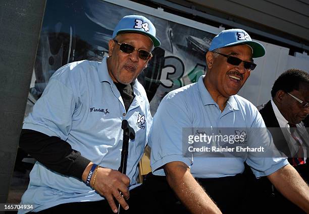 Wendell Scott Jr. And brother Franklin Scott share a laugh during a ceremony for the unveiling of a historical marker in honor of their father,...