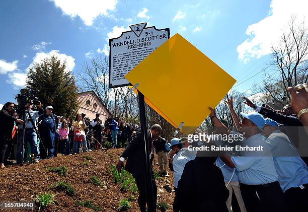 Historical marker in honor of former NASCAR driver Wendell O. Scott Sr. Is unveiled by members of his family on April 5, 2013 in Danville, Virginia.