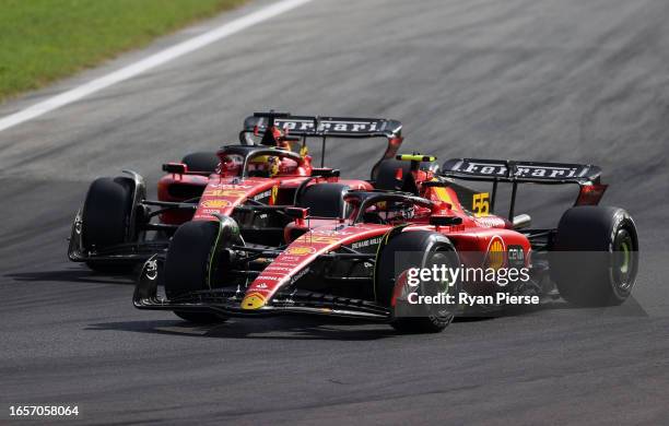 Carlos Sainz of Spain driving the Ferrari SF-23 leads Charles Leclerc of Monaco driving the Ferrari SF-23 during the F1 Grand Prix of Italy at...