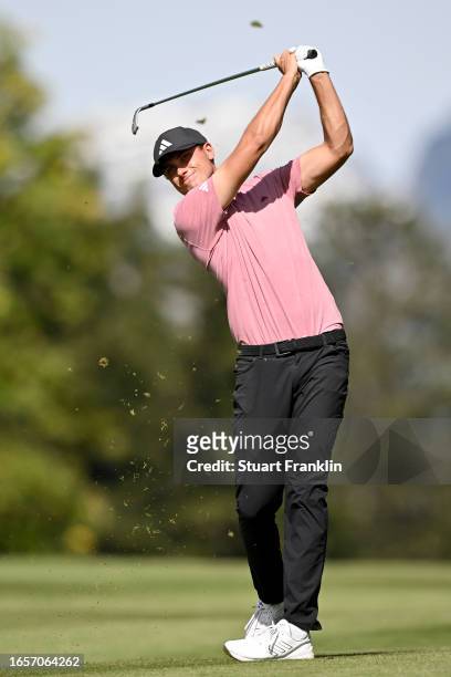 Ludvig Aberg of Sweden plays his second shot on the 14th hole during Day Four of the Omega European Masters at Crans-sur-Sierre Golf Club on...
