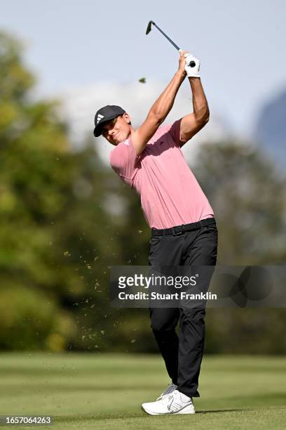 Ludvig Aberg of Sweden plays his second shot on the 14th hole during Day Four of the Omega European Masters at Crans-sur-Sierre Golf Club on...