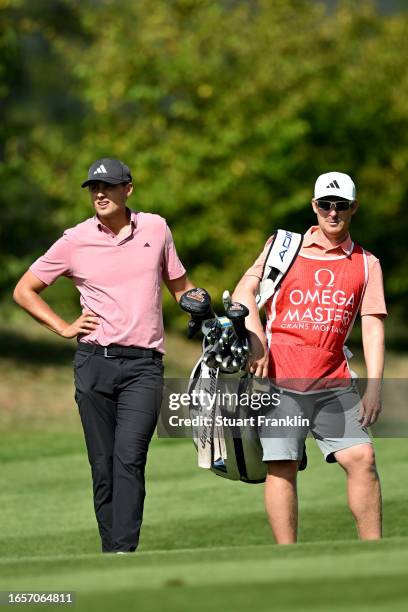 Ludvig Aberg of Sweden prepares to play his second shot on the 14th hole during Day Four of the Omega European Masters at Crans-sur-Sierre Golf Club...