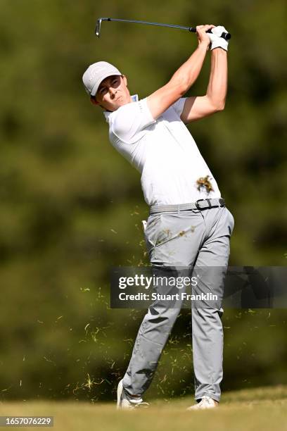 Matt Fitzpatrick of England plays his second shot on the 14th hole during Day Four of the Omega European Masters at Crans-sur-Sierre Golf Club on...