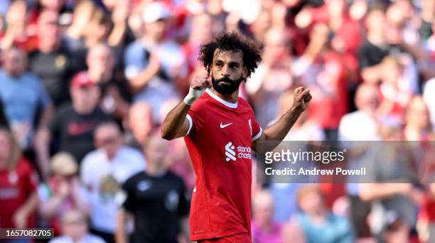 Mohamed Salah of Liverpool celebrates after scoring the third goal during the Premier League match between Liverpool FC and Aston Villa at Anfield on...