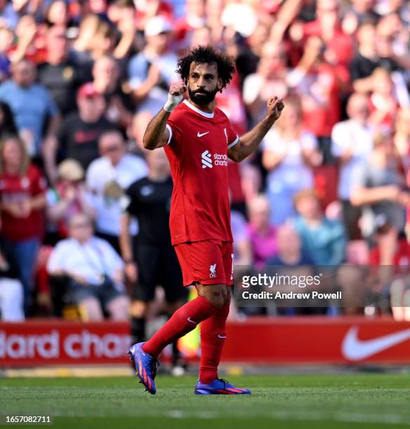 Mohamed Salah of Liverpool celebrates after scoring the third goal during the Premier League match between Liverpool FC and Aston Villa at Anfield on...