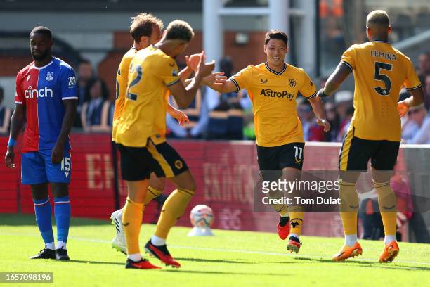 Hwang Hee-Chan of Wolverhampton Wanderers celebrates after scoring the team's first goal during the Premier League match between Crystal Palace and...