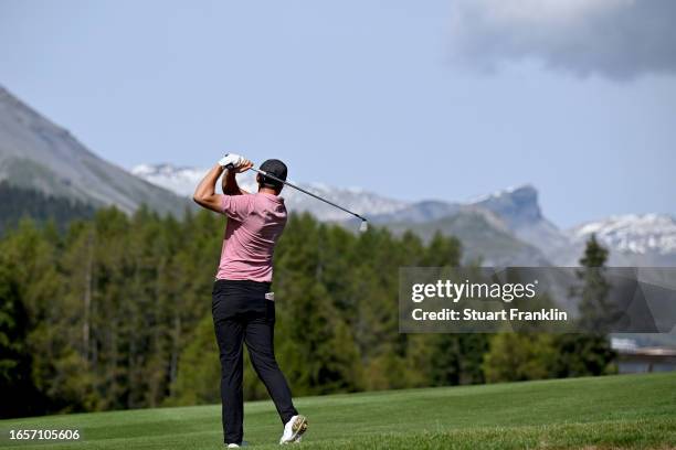 Ludvig Aberg of Sweden plays his second shot on the 15th hole during Day Four of the Omega European Masters at Crans-sur-Sierre Golf Club on...