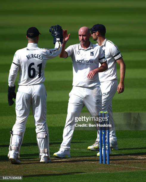 Chris Rushworth of Warwickshire celebrates taking the wicket of Rory Burns of Surrey during day one of the LV= Insurance County Championship Division...