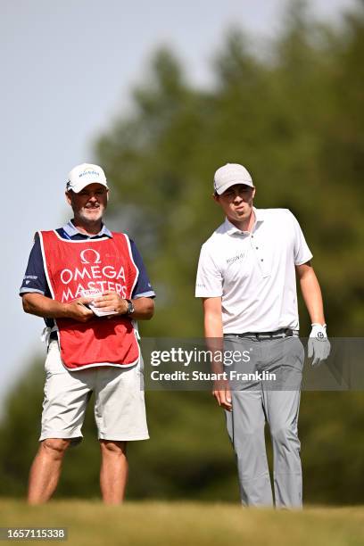 Matt Fitzpatrick of England prepares to play his second shot on the 14th hole during Day Four of the Omega European Masters at Crans-sur-Sierre Golf...