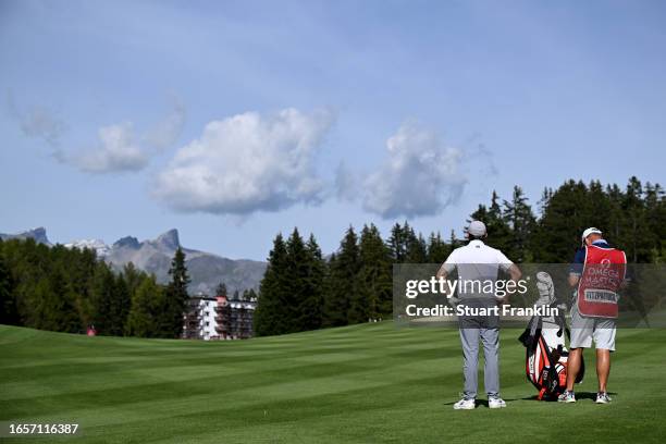 Matt Fitzpatrick of England prepares to play his second shot on the 15th hole during Day Four of the Omega European Masters at Crans-sur-Sierre Golf...