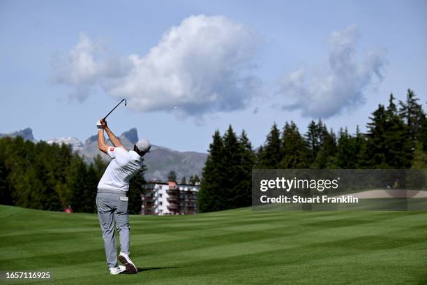 Matt Fitzpatrick of England plays his second shot on the 15th hole during Day Four of the Omega European Masters at Crans-sur-Sierre Golf Club on...