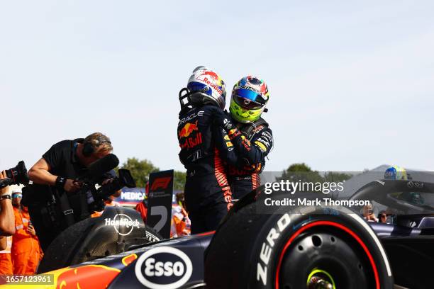 Race winner Max Verstappen of the Netherlands and Oracle Red Bull Racing and Second placed Sergio Perez of Mexico and Oracle Red Bull Racing...