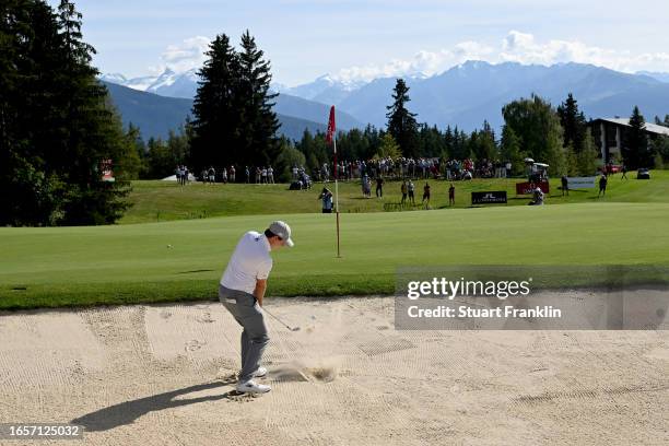 Matt Fitzpatrick of England plays his fourth shot on the 15th hole during Day Four of the Omega European Masters at Crans-sur-Sierre Golf Club on...