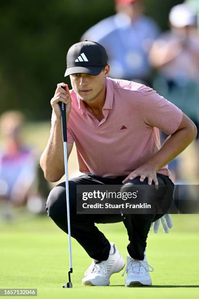 Ludvig Aberg of Sweden prepares to play his second shot on the 17th hole during Day Four of the Omega European Masters at Crans-sur-Sierre Golf Club...