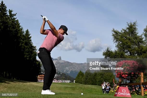 Ludvig Aberg of Sweden plays his tee shot on the 18th hole during Day Four of the Omega European Masters at Crans-sur-Sierre Golf Club on September...