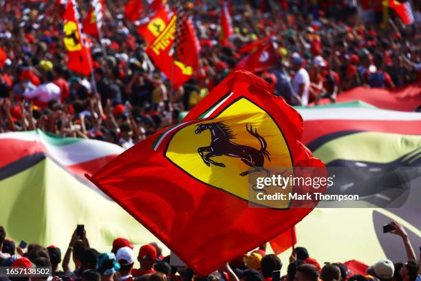 Ferrari fans wave flags at the podium celebrations during the F1 Grand Prix of Italy at Autodromo Nazionale Monza on September 03, 2023 in Monza,...