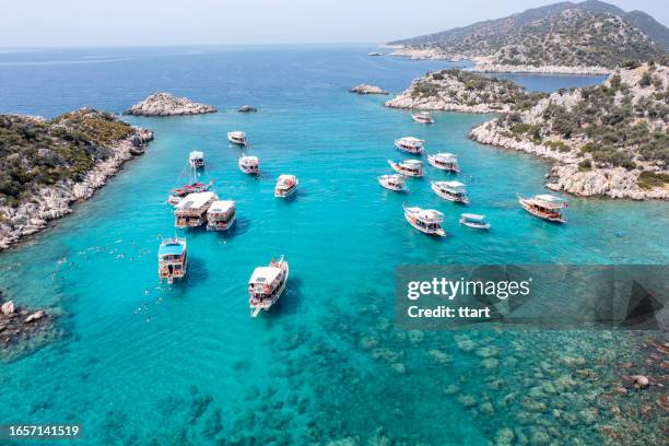 aerial view of  kalekoy, demre beach and yacth trip in antalya - boat top view stockfoto's en -beelden