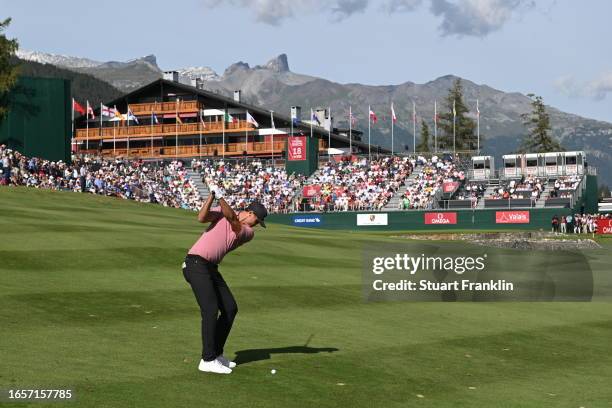 Ludvig Aberg of Sweden plays his second shot on the 18th hole during Day Four of the Omega European Masters at Crans-sur-Sierre Golf Club on...