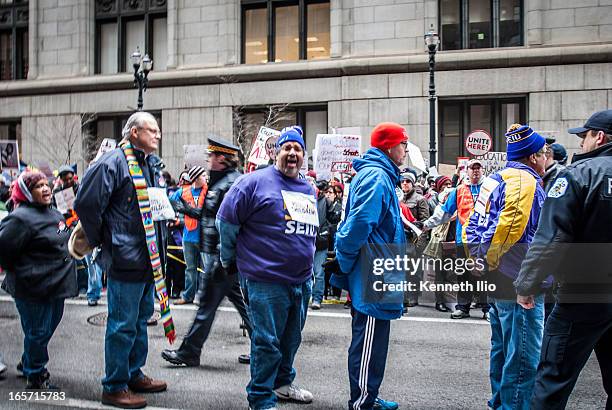 Chicago Teachers Union, SIEU Local 1, friends and sympathizers protesting planned Chicago Public School closings. The Loop, Chicago, March 27, 2013.