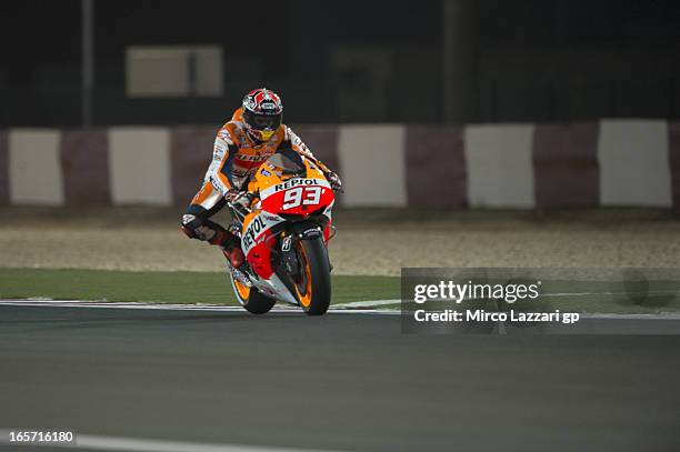 Marc Marquez of Spain and Repsol Honda Team heads down a straight during the MotoGp of Qatar - Free Practice at Losail Circuit on April 5, 2013 in...