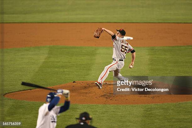 Pitcher Tim Lincecum of the San Francisco Giants pitches to Luis Cruz of the Los Angeles Dodgers in the first inning during the MLB game at Dodger...
